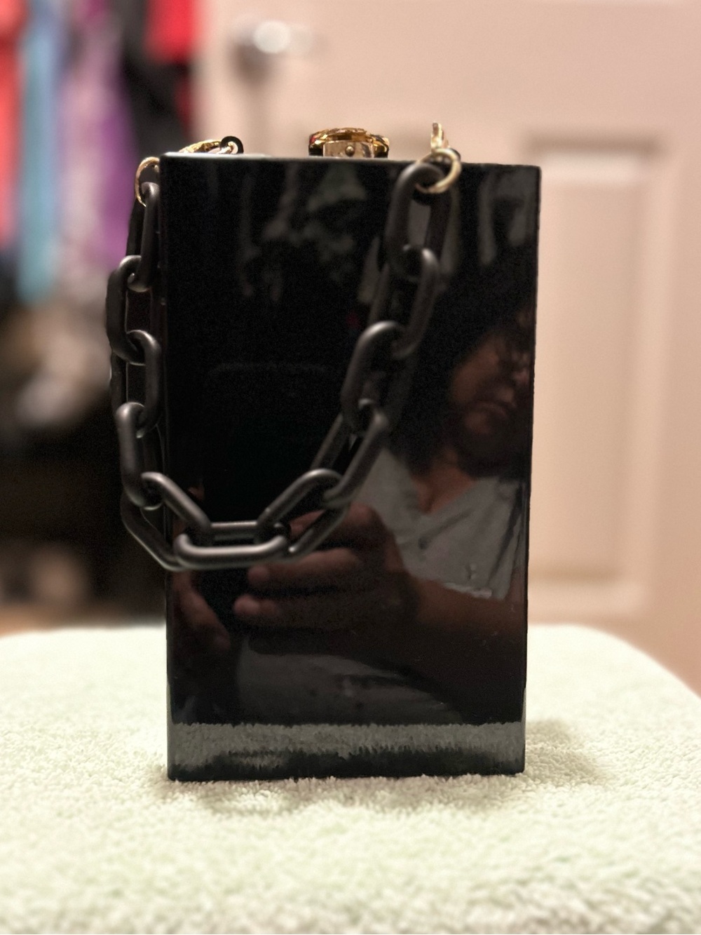 A New Day sleek black acrylic box clutch